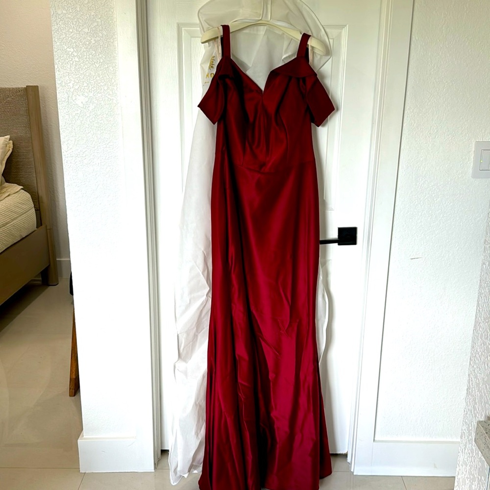 Elegant red dress for wedding or similar event.